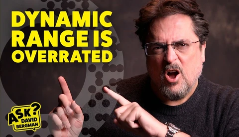 Man with glasses gesturing while speaking, with yellow text reading "Dynamic Range is Overrated."