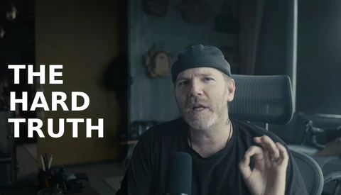 Man wearing a black beanie speaking directly to camera with text overlay reading 'THE HARD TRUTH'.