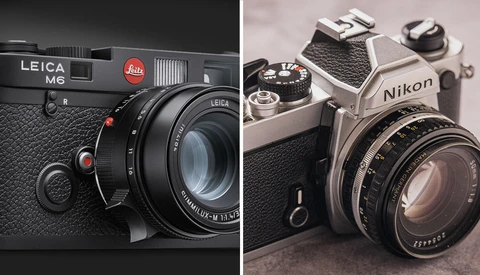 Side-by-side comparison of a Leica M6 rangefinder camera and a Nikon FM2 SLR camera