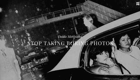 Black and white photograph of people in a car with overlaid text reading "STOP TAKING BORING PHOTOS."
