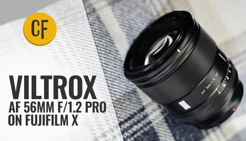 Viltrox AF 56mm f/1.2 Pro lens mounted on Fujifilm X camera body, displayed on textured fabric background.