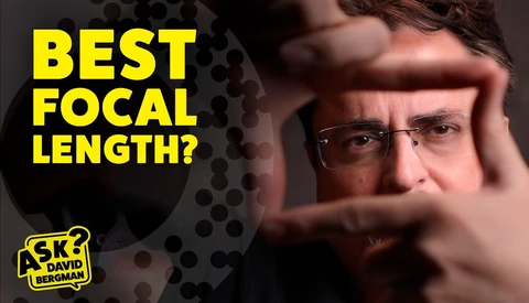 Man wearing glasses framing his face with hands, with yellow text overlay asking "BEST FOCAL LENGTH?".