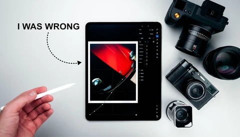 Graphic illustration showing photography equipment and a hand holding a stylus pointing to an iPad displaying a red car image with self-critique text