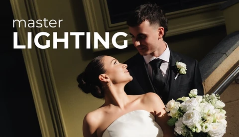 Bride and groom in elegant indoor portrait with warm ambient lighting