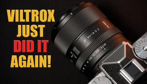 Viltrox lens on vintage film camera with bold text overlay reading 'VILTROX JUST DID IT AGAIN!'