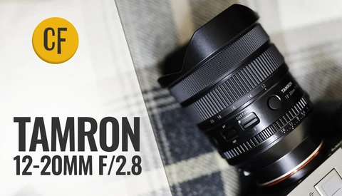 Tamron 12-20mm f/2.8 wide-angle zoom lens with lens hood attached