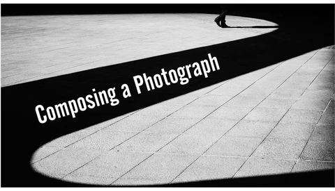 Graphic design with text overlay on architectural shadows and pavement