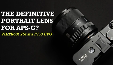 Viltrox 75mm F1.8 EVO lens mounted on camera body against dark background