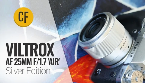 Viltrox AF 25mm f/1.7 Air Silver Edition lens displayed with colorful abstract background