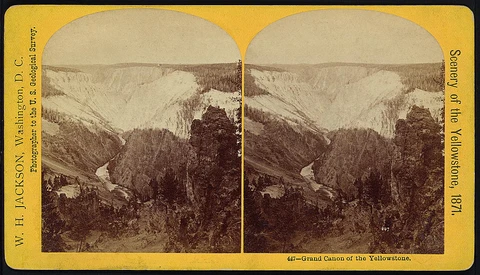 Stereoscopic card showing the Grand Canyon of the Yellowstone with river and forested canyon walls