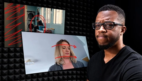 Male photographer demonstrating head tracking technology with overlay graphics on monitor showing facial mapping