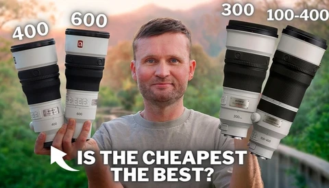Photographer holding four telephoto lenses labeled with focal lengths 400, 600, 300, and 100-400