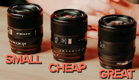 Three 35mm prime lenses side by side on a wooden table, with bold orange text reading SMALL, CHEAP, and GREAT overlaid below them.