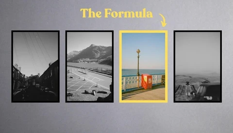 Four framed prints; the third, a seaside pier with a red phone box, is in color while the others are black and white.