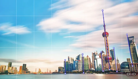 Shanghai Pudong skyline with the Oriental Pearl Tower, overlaid with blue perspective correction guide lines and anchor points