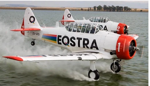 Justin de Reuck Hangs Out Of An Aerobatic Plane With No Seatbelt To Get The Shot