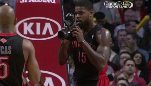  NBA Player Picks Up Photographer's DSLR and Snaps Away
