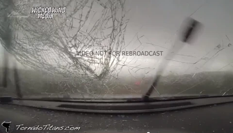 Insane Video Showing Storm Chasers Get Caught In a Tornado