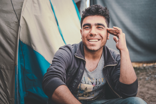 man refugee smiling
