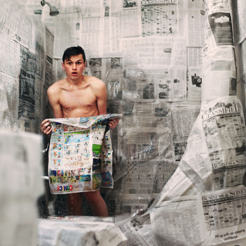 shower newspaper man