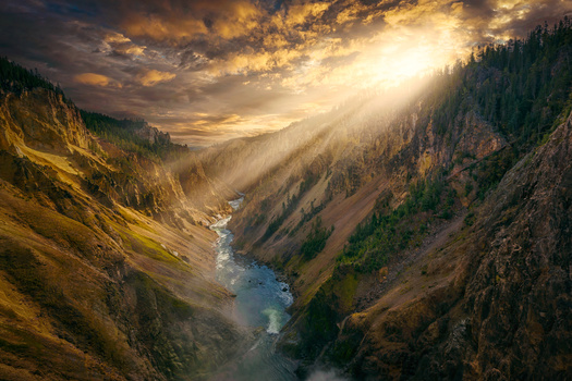An early morning shot of Yellowstone Canyon with a dramatic sky. early morning shot of yellowstone canyon with a dramatic sky