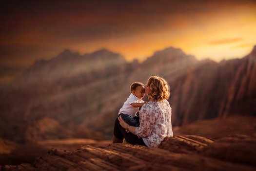 A portrait of a mother and her young child. portrait of a mother and her young child