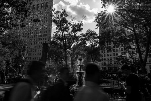 High contrast scene in Madison Park Stree photography in Madisson Park, NYC. Black and white photography.