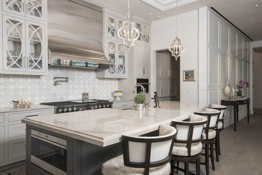 An interior architectural image of a luxury kitchen showing shadows caused by flash