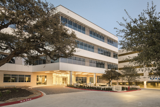 an exterior photo of the front of an office building