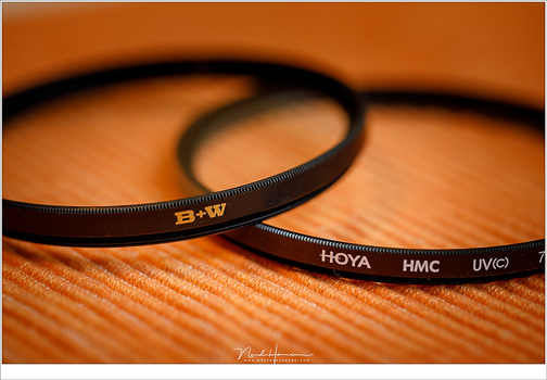 A couple of modern UV filters, specially made for autofocus lenses. Do these filters have any use, or are they relics from the beginning of photography?
