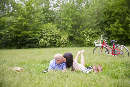 Couple kissing with bikes