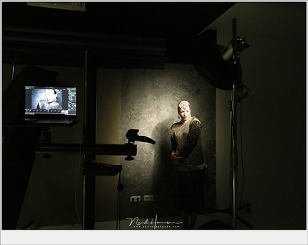 When working in a studio with flash lights, the flash sync will render a dark EVF in combination with the exposure simulation. You need to turn exposure simulation off in order to use the EVF. Don't forget to turn it back on again.