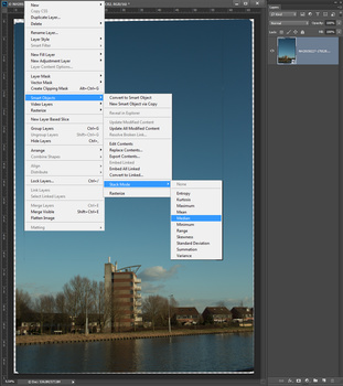 Make a smart object of all the layers if the alignment is correct. When that is done, you can stack the smart object with the median method. This can take some time to finish.