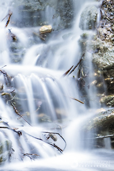 an image of a waterfall with silky water