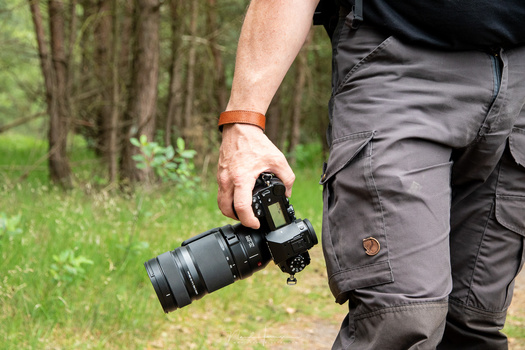 The Panasonic DC-S1 mirrorless camera is a very large and heavy full frame camera. It resembles a DSLR, although it has no mirror inside.
