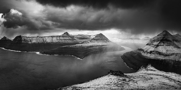 Landscapes in black and white is something most of us ignore. We love to see colors in our landscape photography, showing us the beautiful colors of a sunrise or sunset. Even if we prefer colors, a black and white conversion can help when processing the p