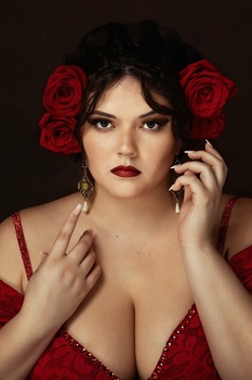 portrait of a woman with roses in her hair