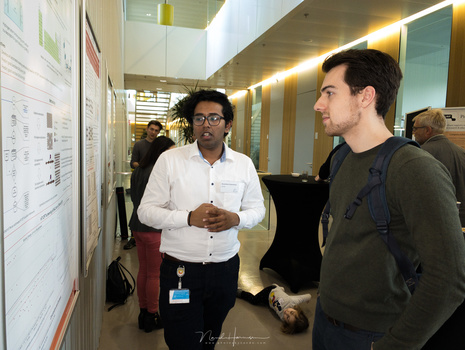 University students during a poster presentation, shot with a smartphone and lit by the Profoto C1 Plus. It does not feel right, taking photos with a smartphone under these circumstances. It does not feel professional, even with the Profoto flash unit in