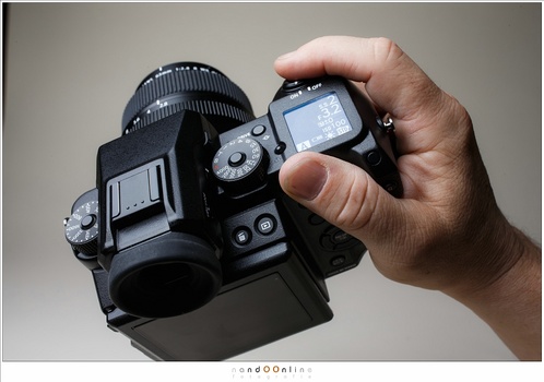 One of the first affordable medium format cameras. Although the mirrorless system allows a smaller camera, they are not small at all. Also lenses will be large and heavy. The large sensor will allow a wonderful depth of field.