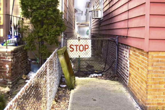 an overcooked HDR photo of an alley