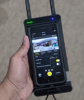 The Farsight system uses your phone or tablet (in this case, my iPhone 6S) and hooks it up to a receiver that boosts the signal range to control the camera significantly. The Farsight system uses your phone or tablet (in this case, my iPhone 6S) and hooks it up to a receiver that boosts the signal range to control the camera significantly.
