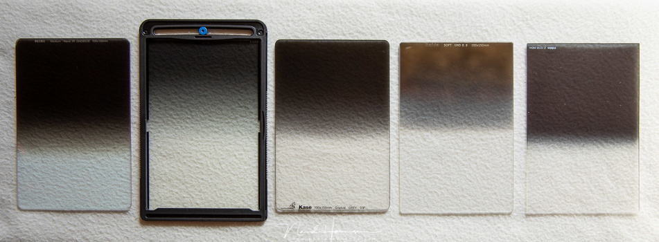 A selection of 3 stop GND filters from different brands. Some of these are really color neutral, others show a slight color cast. Some of these produce flares very quickly, others are very resistant to flares. From left to right: NiSi, Benro, Kase, Haida,