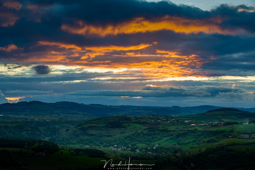 This is the original sky. The image is the result of merging three different exposures to capture the whole dynamic range of the landscape