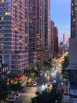 an iPhone photo of a downtown twilight scene