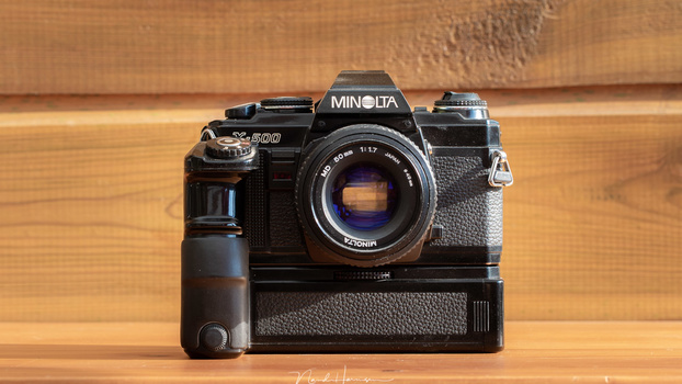 A very modern camera from the eighties in the previous millenium. The Minolta X-500 with modor Drive MD-1 was my camera. Using the camera was very easy. No extensive menus or customized buttons. Just a shutter dial, aperture ring, and a dial to set the fi