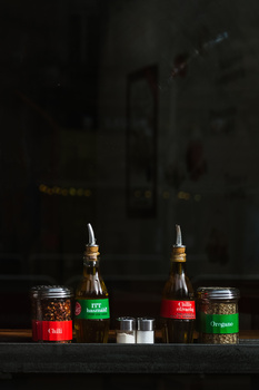 Learning why and how to crop in photography Condiments on a cafe table