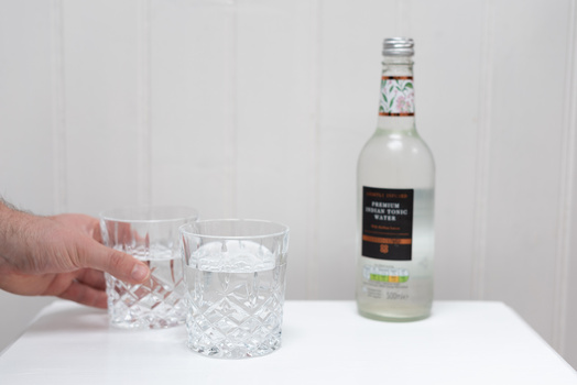 Offer a drink Tonic water poured for models