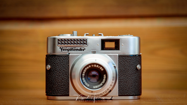 An old Voigtländer camera with a light meter above the company name. It measures the ambient light, nothing more. Today the light meters are more sophisticated.