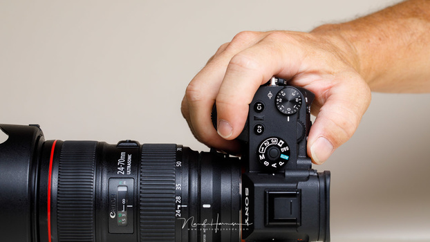The build-in lens correction option can be used to correct lens-errors. But be carefull when using third party lenses. It can produce strange results.