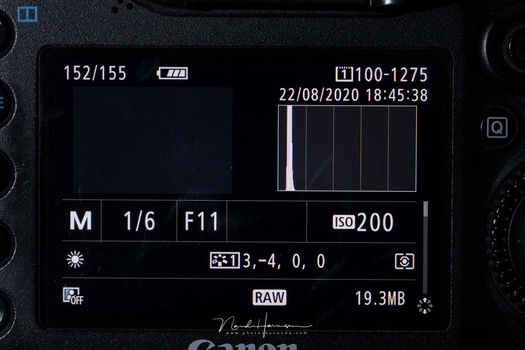 With the shutter speed measured on the gray card, the photo of the black sheet will be exposed correctly, not influenced by the dark tones of the sheet.